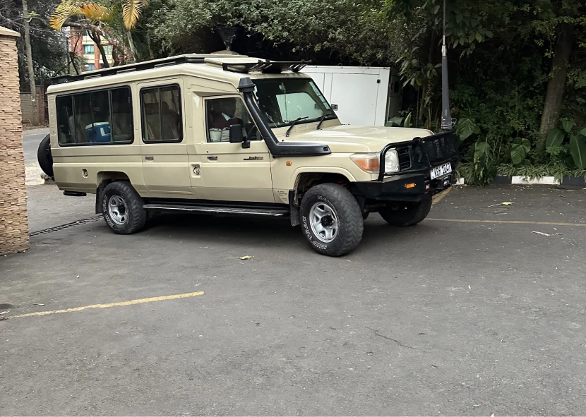 Safari vehicle parked in a lot